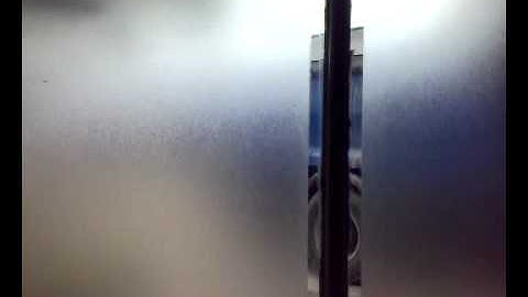 Bouwplaats in- en uitrit recht voor de deur. Opname 22-7-2009