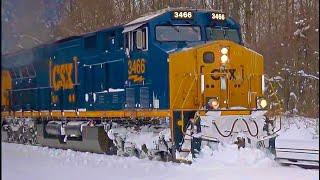 7 Engines on 2 Mile Long Train Slowly Pulls Thru Heavy Snow