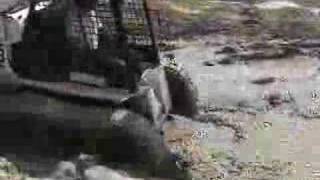 McLaren Over-the-tire track for skid steer
