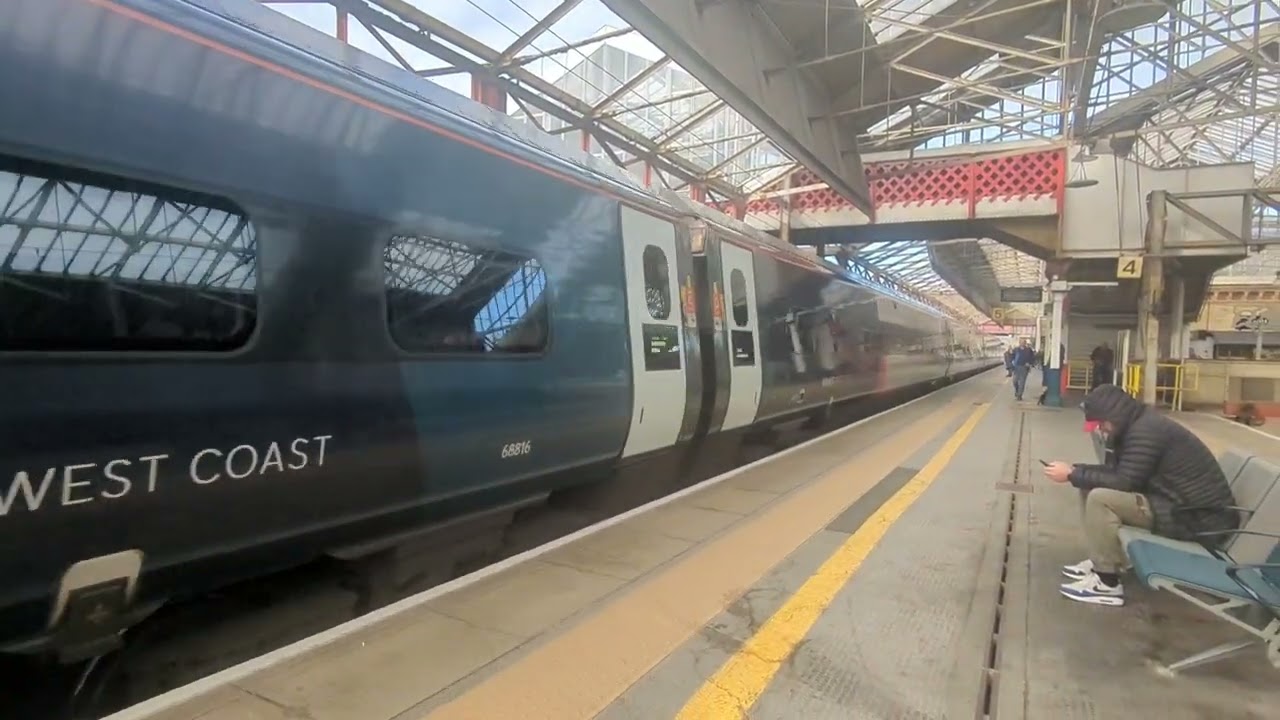 Class 390016 departing crewe 
