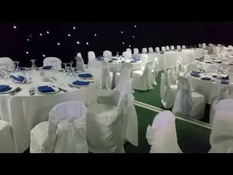 wedding-chair-covers-at-the-market-rasen-race-course-white-chair-covers-with-white-taffeta-sashes