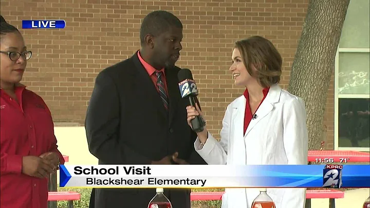 Britta shares science experiment with Blackshear Elementary