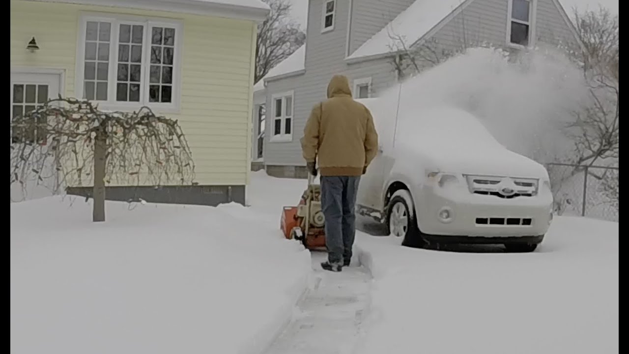 Cleaning up snow from our blizzard of 2021 - YouTube