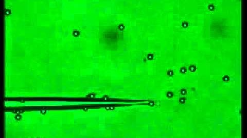 Detailed process of driving six particles to form a triangle.