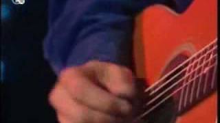 Tommy Emmanuel - The Hunt (with percussion introduction)