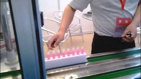 Internal company test video lip gloss and mascara filling and capping machine