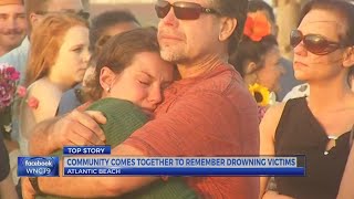 100+ attend vigil for man and boy who died at Atlantic Beach