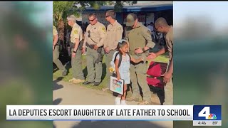 LA deputies escort daughter of late father to school