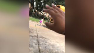 Car nearly hits hit child getting off school bus