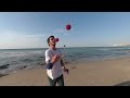 Juggling 4 balls by the beach in VR180. Best to watch in Oculus Go [3D with Vuze XR]