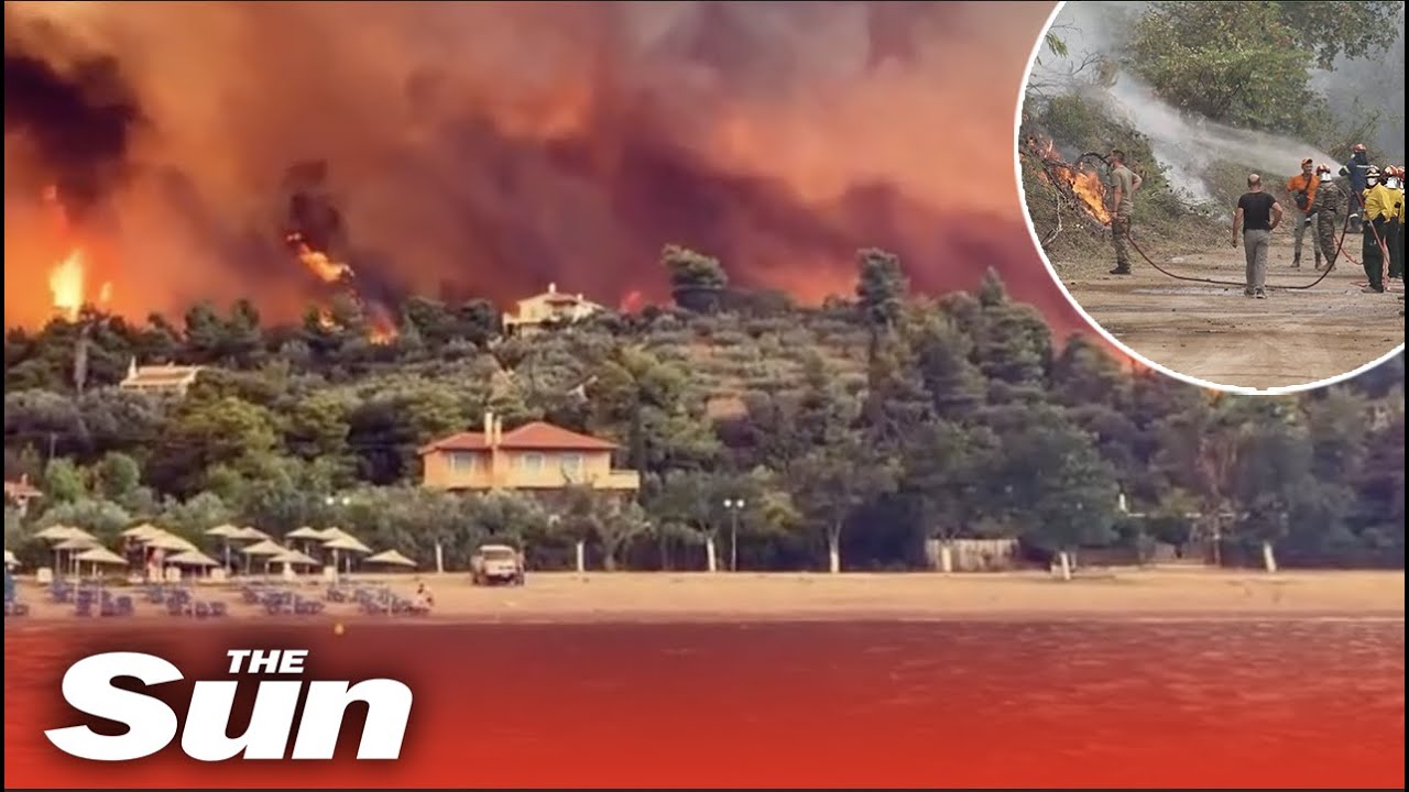 Wall of flame rises on Greek beach as wildfires spread