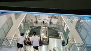 Woman Dies After Falling Into Shopping Mall Escalator