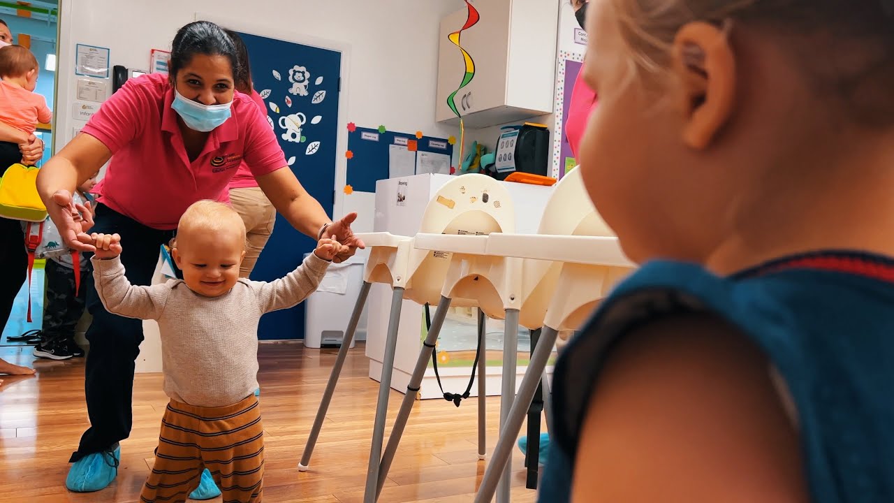 Naomi is picking up her little brother from daycare.