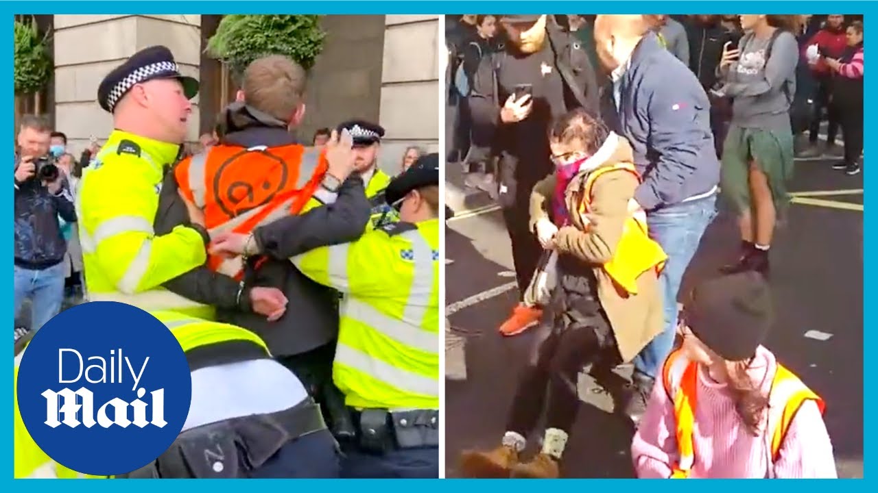 Police and bystanders drag Just Stop Oil protesters out of road at Mayfair