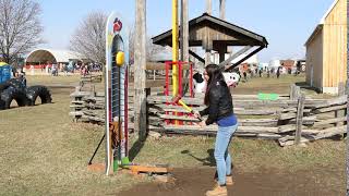 Maggie playing kids high striker game @ColSunshine