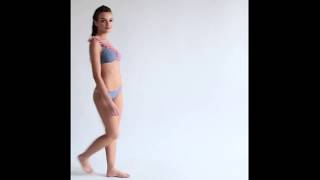 Juliette Lingerie  - sexy model showing off a bikini in a cold room