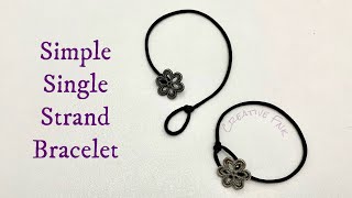 Simple single strand bracelet with button &amp; loop clasp