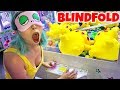 CAN'T BELIEVE SHE WON BLINDFOLDED PLAYING CLAW MACHINES!!