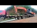 Tata Hitachi Ex 210 Excavator machine loading Trailer