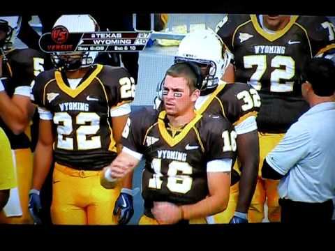 Karsten Sween signs something dirty to someone on the field