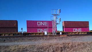 UP 7792 leading stack train east of Gibbon 