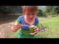Survival Skills: Helping Girl Fishing Big And Cook Fish For A Survival Food Together