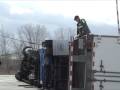 Semi-Trailer Truck Rollover After Weight Shift of Steel Coils in Palatine