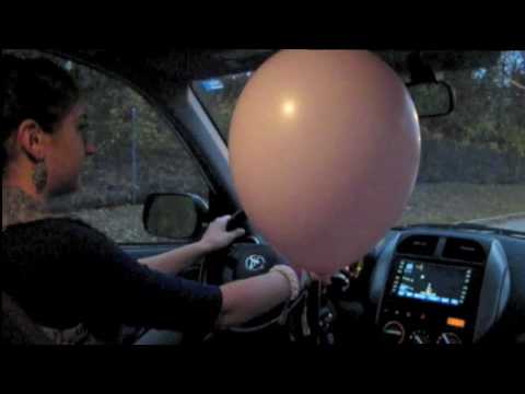 Driving a Car with a Helium Balloon: Physics