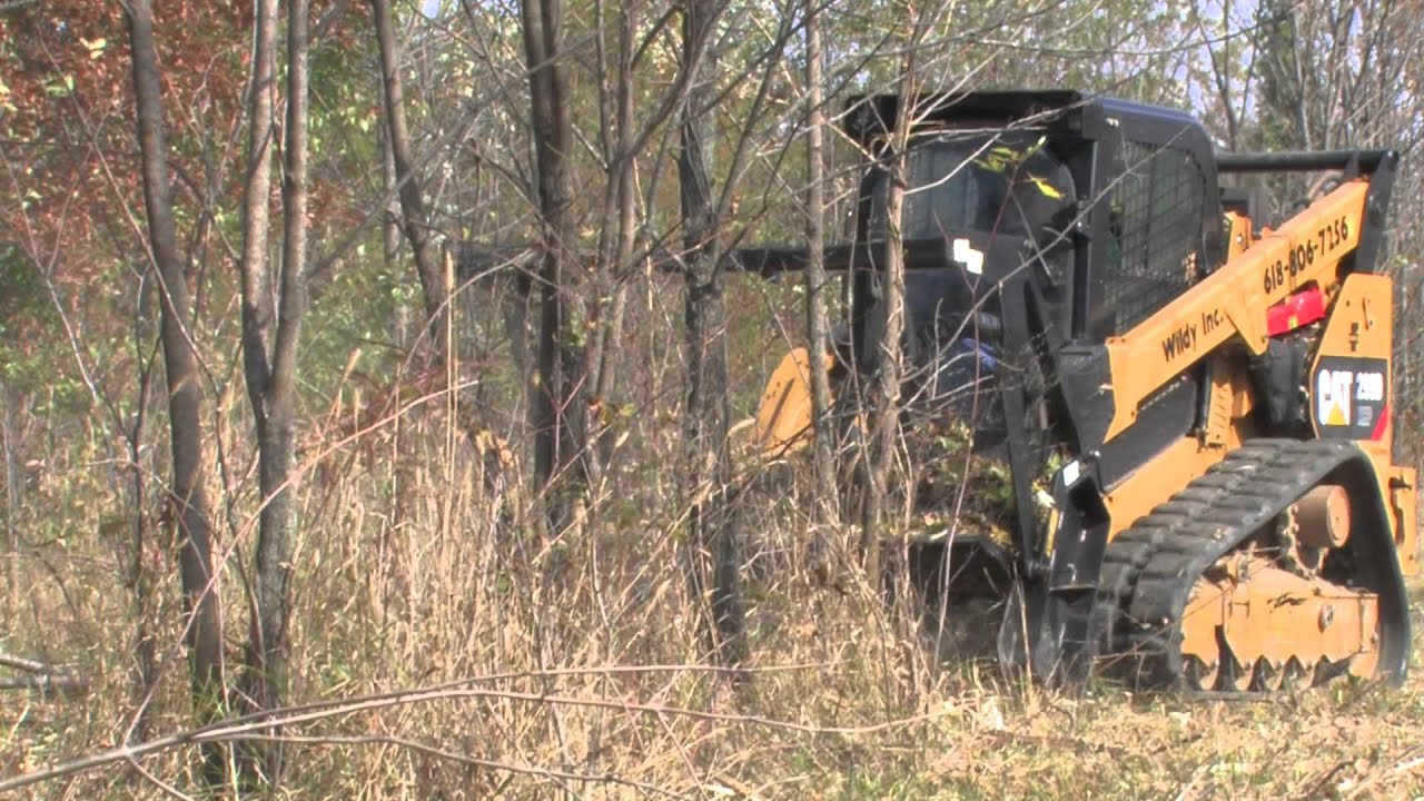 Wildy Inc. Tree Mulching with CAT 299D and 415 mulcher YouTube