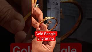 Precision of final touches on 21k gold bangle at Faisal Casting, Sahiwal.