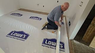 Kitchen subfloor prep - adding housewrap as a moisture barrier and preventing squeaks