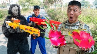 Battle Nerf War: Monkey with Blue Police Nerf Guns Robbers Group Dragon fruit Battle