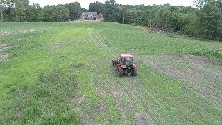 Kioti NX6010 Hauling Sandstone (Beautiful Drone footage) Rock Pile to Lake!