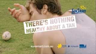 Dark Side of Tanning - boy playing footy