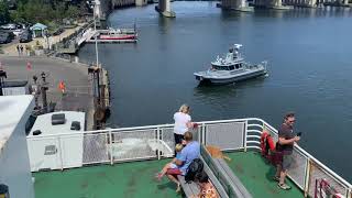 Bridgeport Police Department M-44 leaves the harbor and follows the ferry.