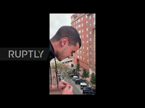 Spain: Ceuta residents play bingo from their balconies in coronavirus lockdown