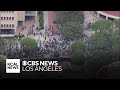 Police dismantle encampment and clear most protesters out of UC Irvine