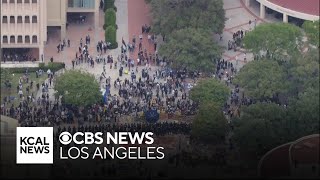 Police dismantle encampment and clear most protesters out of UC Irvine