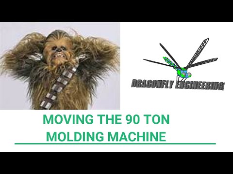Moving the 90 ton injection molding machine