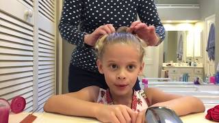 Isabelle's gymnastics hair tutorial!