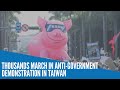 Thousands march to protest import of American pork in Taiwan