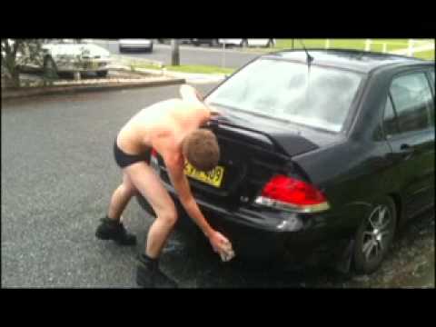 Chris Baldwin washes car in undies