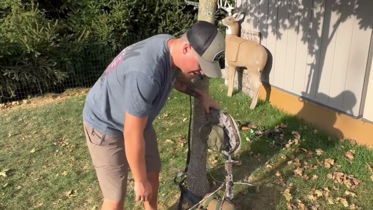 Novix Echo treestand set up with tethrd one skeletors climbing sticks,wrapped with Stealth tape.