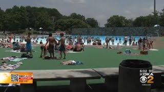 People line up to get into pools as feels like temp hits 100 screenshot 3