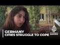 Asylum in Germany: Cities struggle to cope with new arrivals