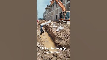 Máy xúc Doosan 140 lắp đặt cống thoát nước