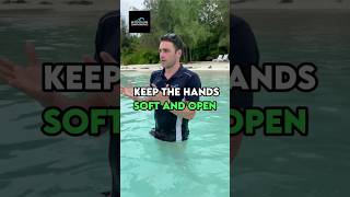 Swim like a pro with relaxed wrists and soft hands #shorts #swimmingtips #swimming screenshot 1