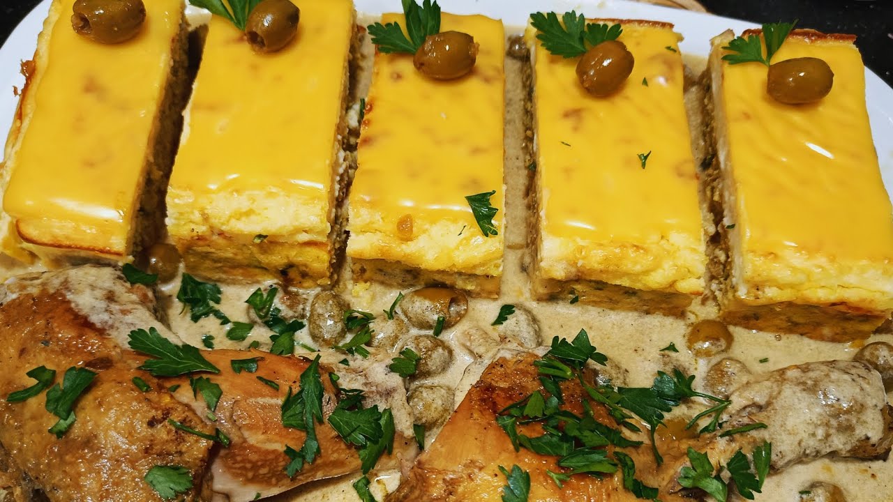 طاجين الجبن بالدجاج و الصلصة البيضاء  و هاديك الطبقة تع الجبن من فوق كي لاموس لهبااال تع البنة 