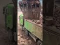 Excavators Load Soil Onto Trucks