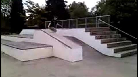 Nose slide down the hubba at my local skatepark